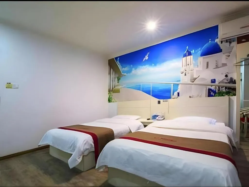 Bed in JUNYI Hotel Jiangxi Xinyu Baoshi Park