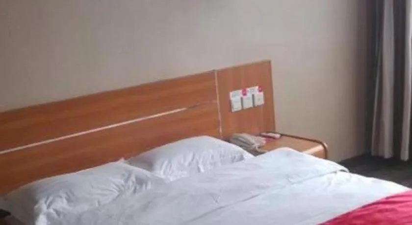 Bed in JUNYI Hotel Jiangxi Xinyu Baoshi Park