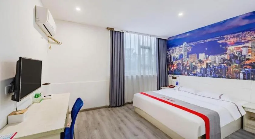 Bed in JUNYI Hotel Jiangxi Xinyu Baoshi Park