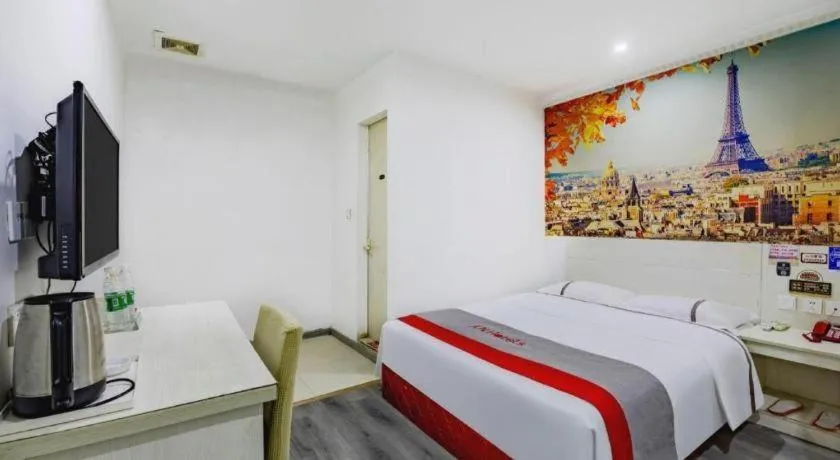 Bed in JUNYI Hotel Jiangxi Xinyu Baoshi Park