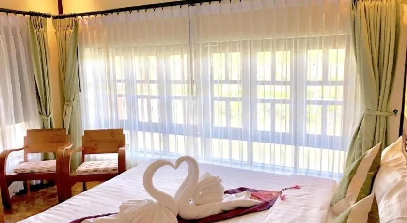 Bed in Chang Kaew Resort Chiang Mai