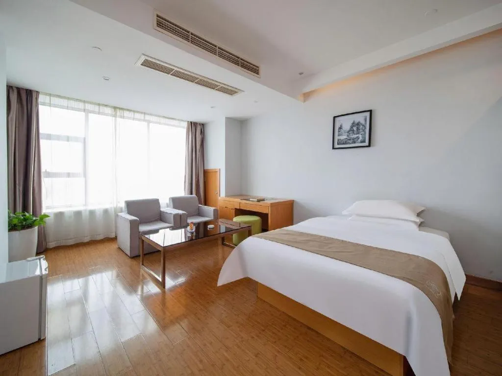 Bed in GreenTree Inn Ningbo Hangzhou Wan New District Lishi Square Business Hotel