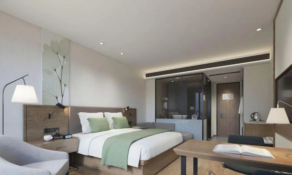 Bed in GreenTree Inn Ningbo Hangzhou Wan New District Lishi Square Business Hotel