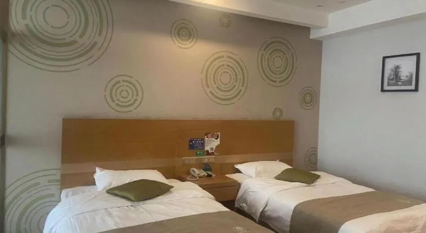 Bed in GreenTree Inn Ningbo Hangzhou Wan New District Lishi Square Business Hotel