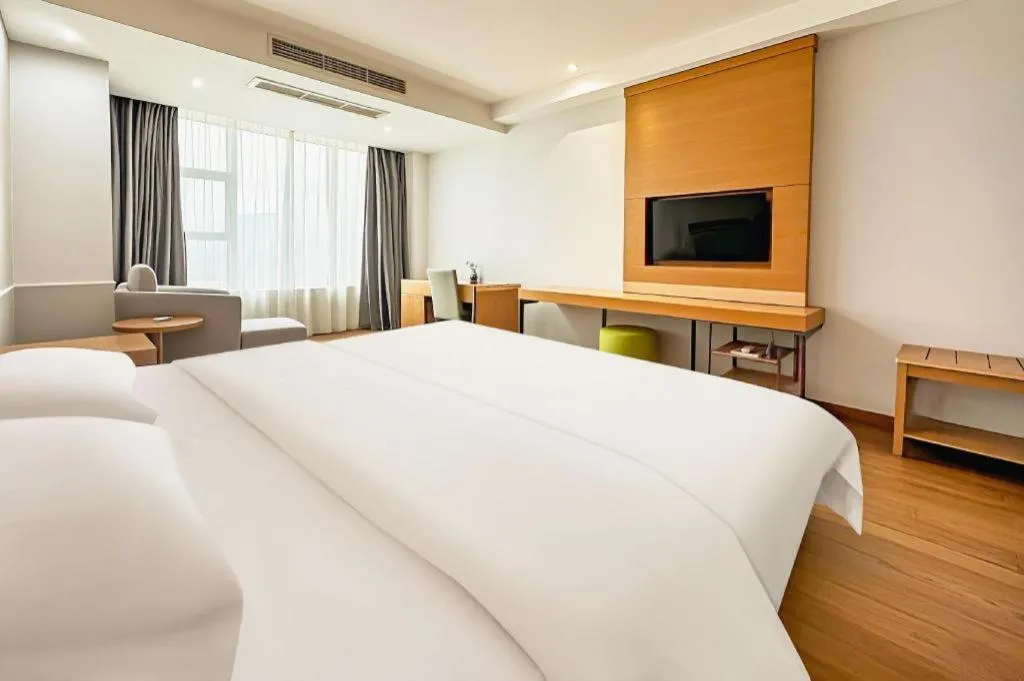 Bed in GreenTree Inn Ningbo Hangzhou Wan New District Lishi Square Business Hotel