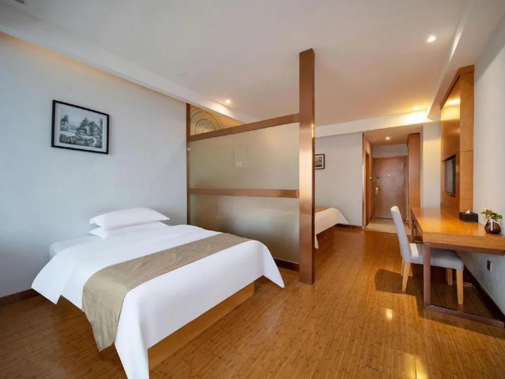 Bed in GreenTree Inn Ningbo Hangzhou Wan New District Lishi Square Business Hotel