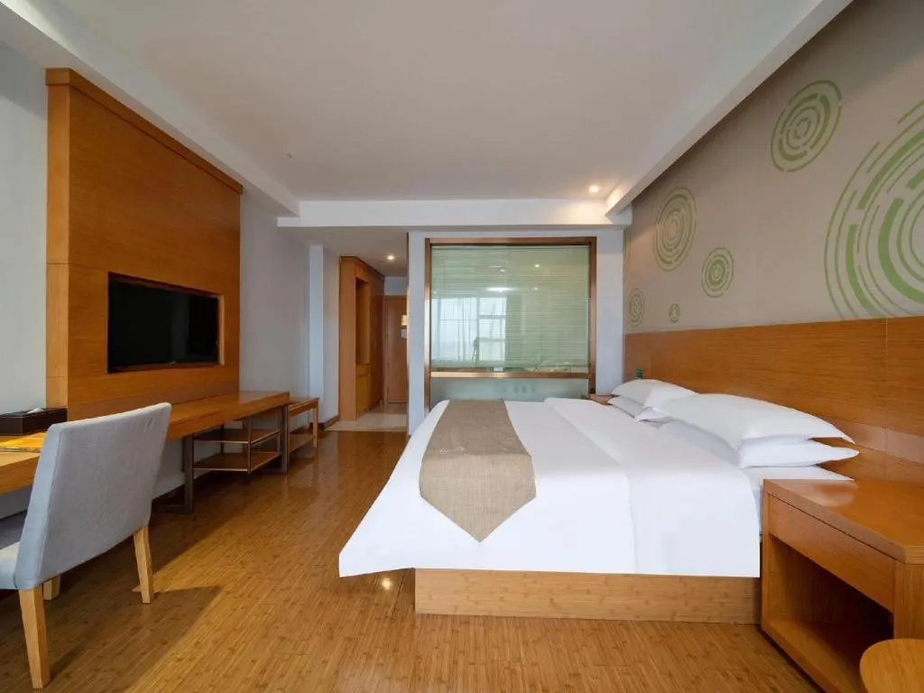 Bed in GreenTree Inn Ningbo Hangzhou Wan New District Lishi Square Business Hotel