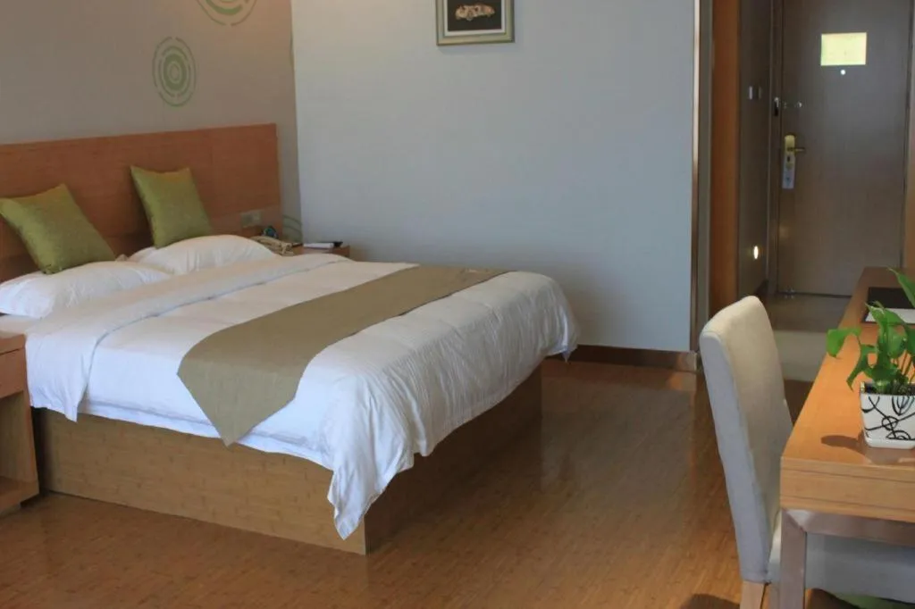 Bed in GreenTree Inn Ningbo Hangzhou Wan New District Lishi Square Business Hotel