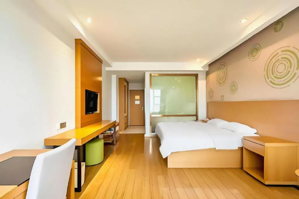 Bed in GreenTree Inn Ningbo Hangzhou Wan New District Lishi Square Business Hotel
