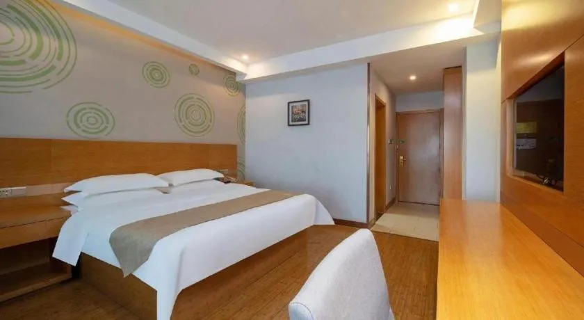 Bed in GreenTree Inn Ningbo Hangzhou Wan New District Lishi Square Business Hotel