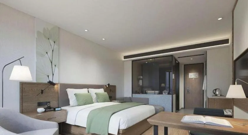 Bed in GreenTree Inn Ningbo Hangzhou Wan New District Lishi Square Business Hotel