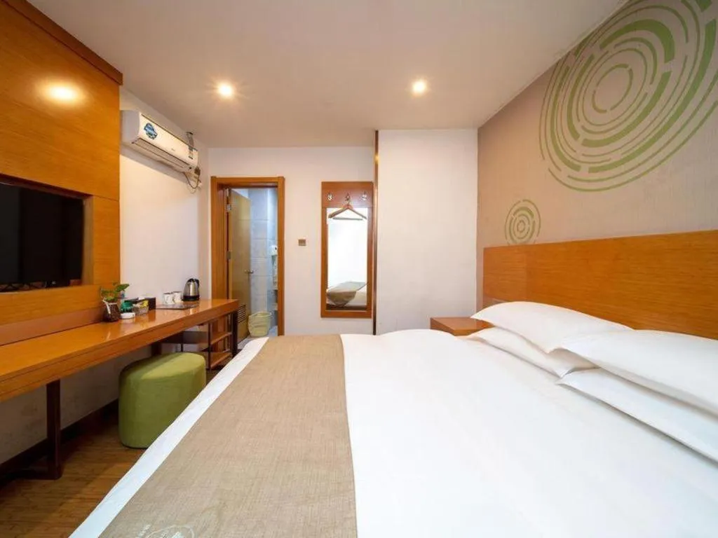 Bed in GreenTree Inn Ningbo Hangzhou Wan New District Lishi Square Business Hotel