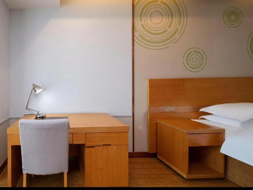 Bed in GreenTree Inn Ningbo Hangzhou Wan New District Lishi Square Business Hotel