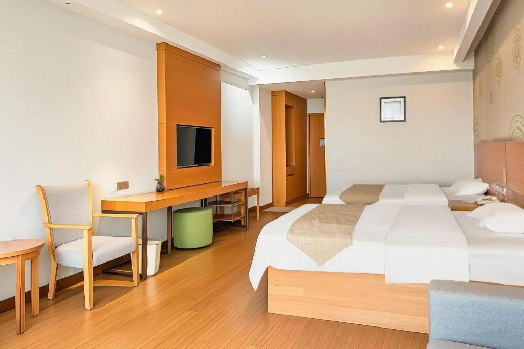 Bed in GreenTree Inn Ningbo Hangzhou Wan New District Lishi Square Business Hotel