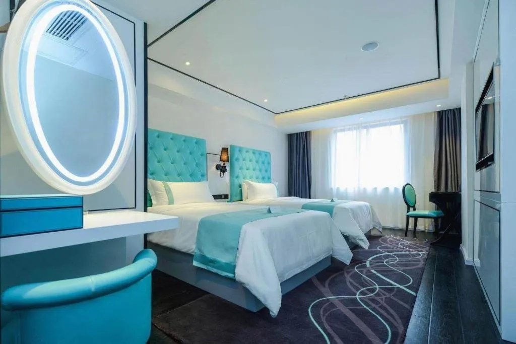 Bed in Xana Hotelle Chongqing Jiefangbei Center Branch