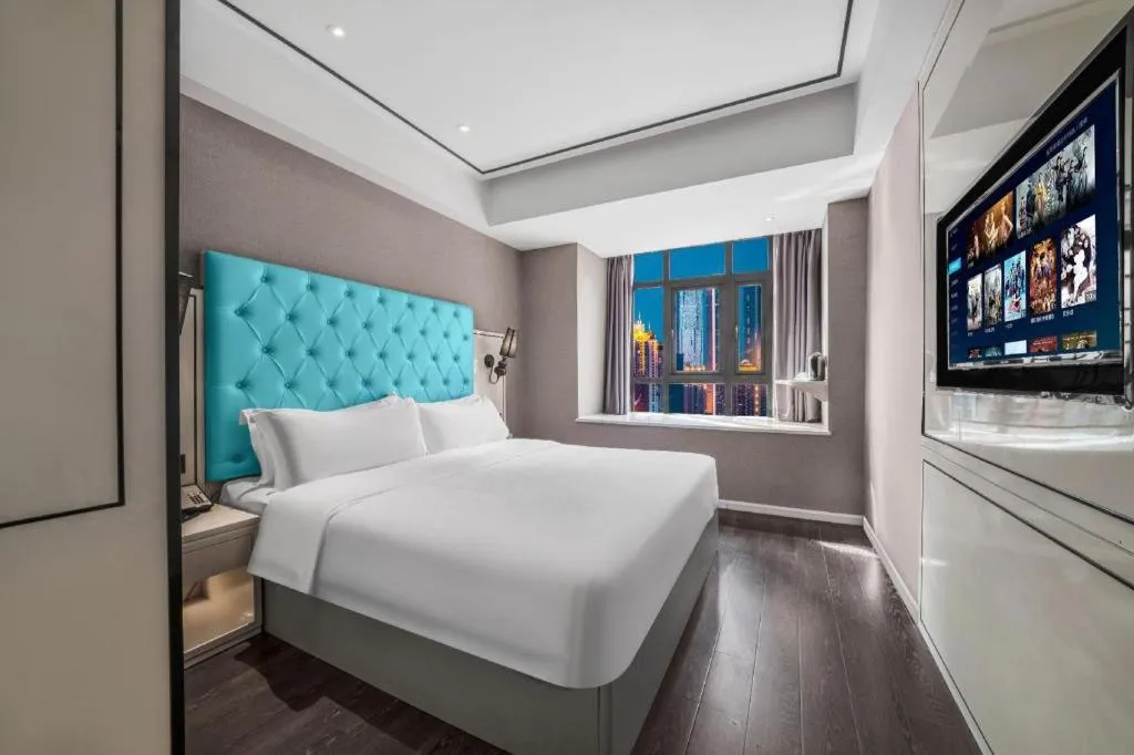 Bed in Xana Hotelle Chongqing Jiefangbei Center Branch