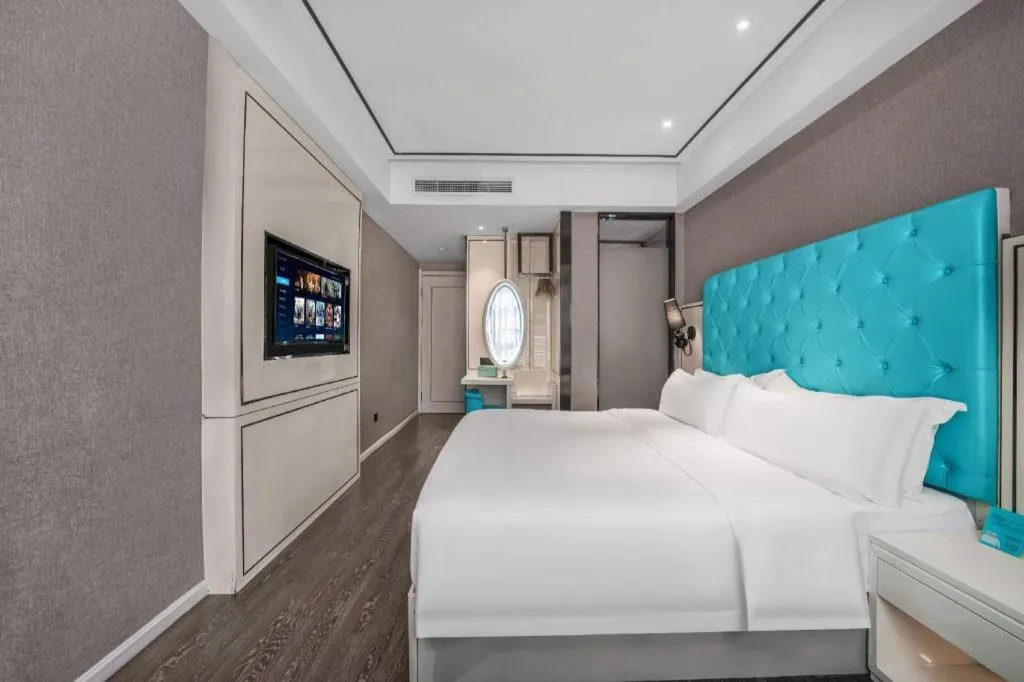 Bed in Xana Hotelle Chongqing Jiefangbei Center Branch