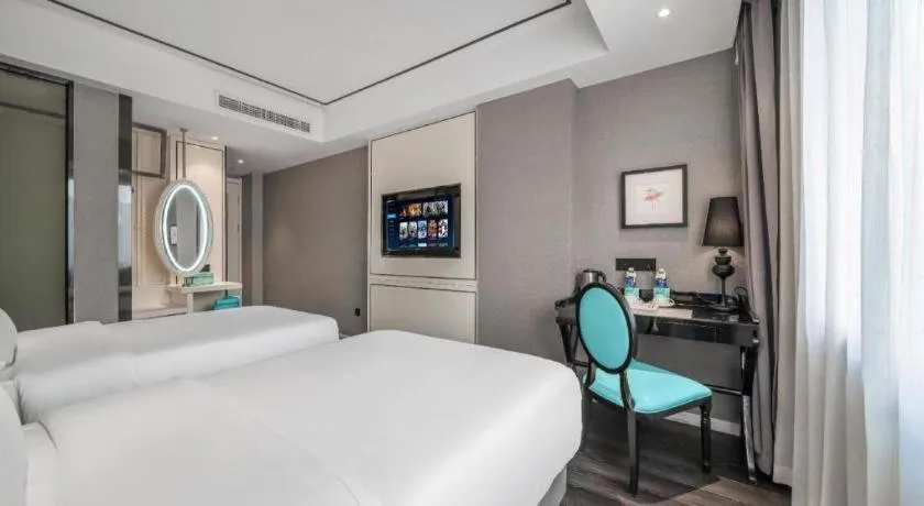 Bed in Xana Hotelle Chongqing Jiefangbei Center Branch