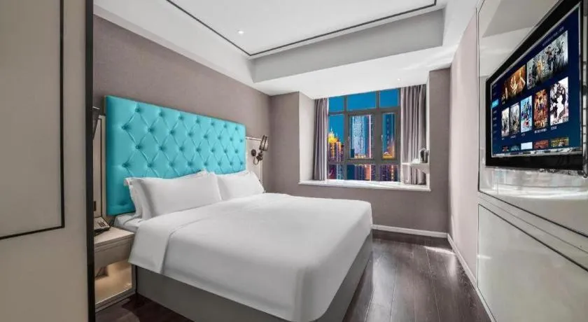 Bed in Xana Hotelle Chongqing Jiefangbei Center Branch