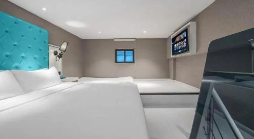 Bed in Xana Hotelle Chongqing Jiefangbei Center Branch