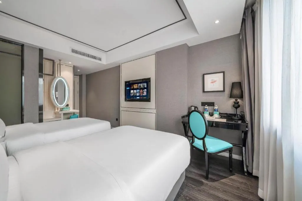 Bed in Xana Hotelle Chongqing Jiefangbei Center Branch