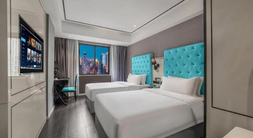 Bed in Xana Hotelle Chongqing Jiefangbei Center Branch