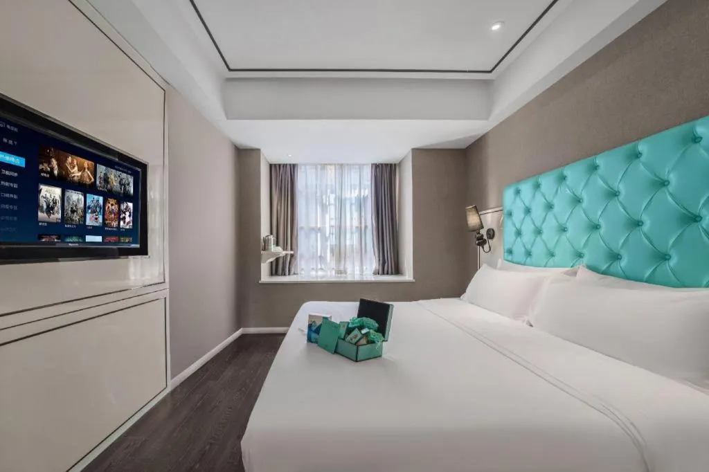 Bed in Xana Hotelle Chongqing Jiefangbei Center Branch