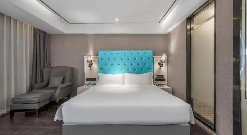 Bed in Xana Hotelle Chongqing Jiefangbei Center Branch