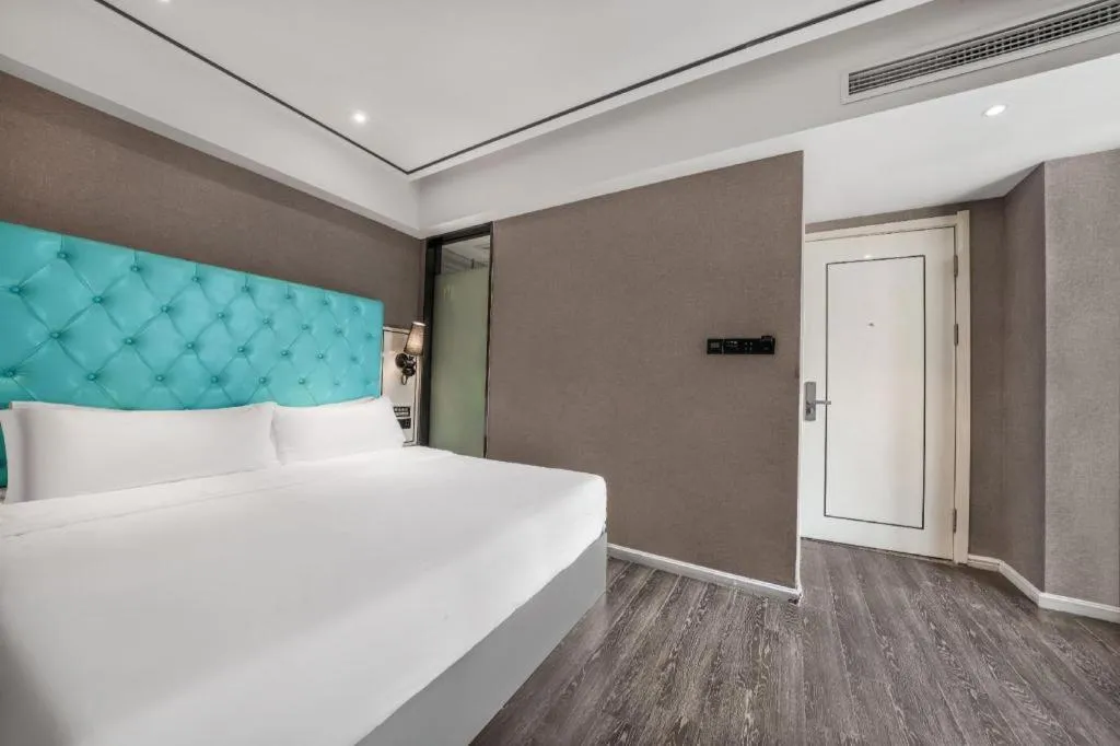 Bed in Xana Hotelle Chongqing Jiefangbei Center Branch