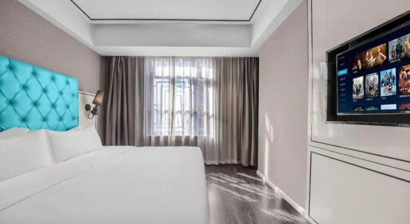 Bed in Xana Hotelle Chongqing Jiefangbei Center Branch