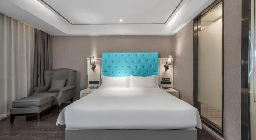 Bed in Xana Hotelle Chongqing Jiefangbei Center Branch