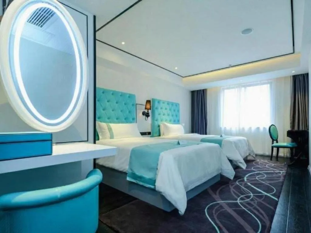 Bed in Xana Hotelle Chongqing Jiefangbei Center Branch