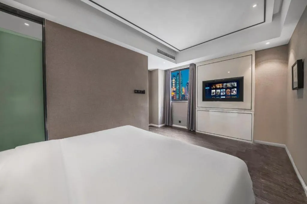 Bed in Xana Hotelle Chongqing Jiefangbei Center Branch