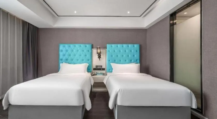 Bed in Xana Hotelle Chongqing Jiefangbei Center Branch