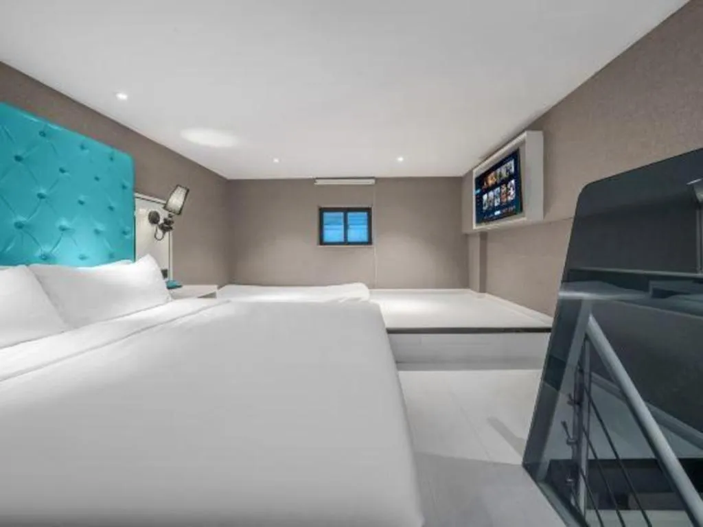 Bed in Xana Hotelle Chongqing Jiefangbei Center Branch