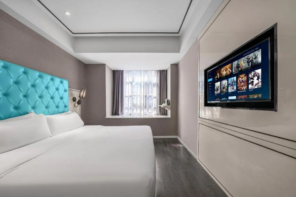 Bed in Xana Hotelle Chongqing Jiefangbei Center Branch