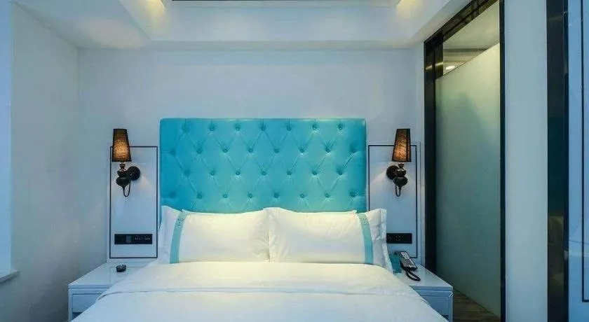 Bed in Xana Hotelle Chongqing Jiefangbei Center Branch