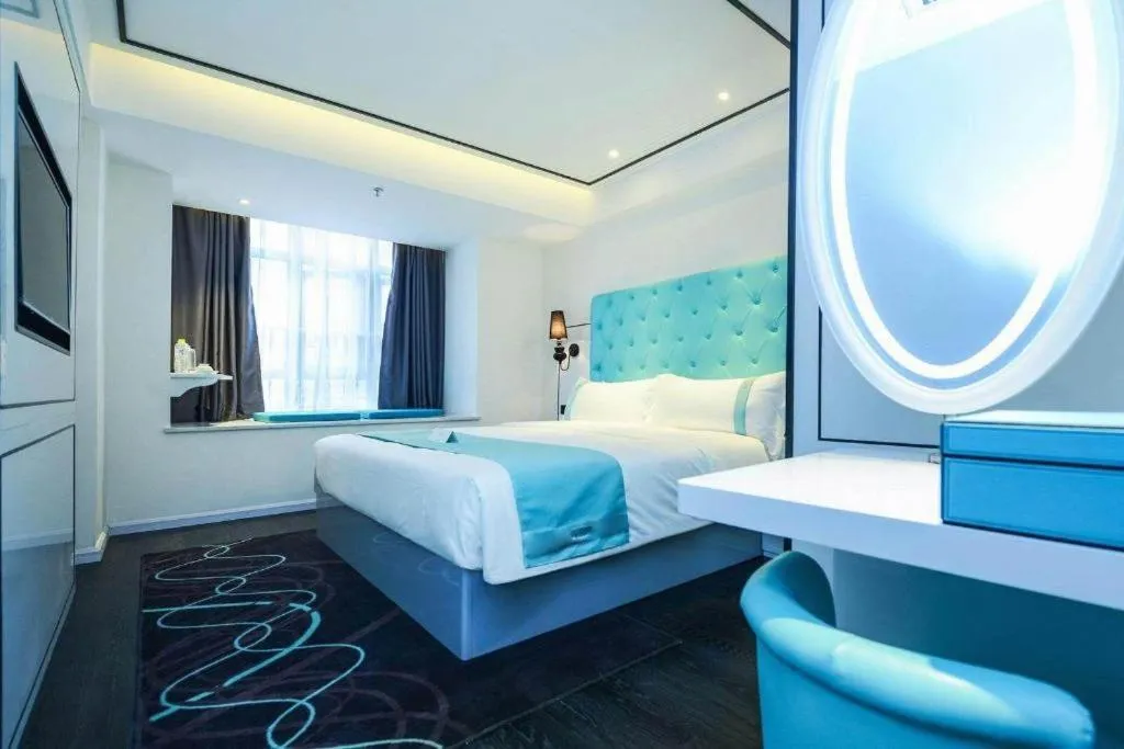 Bed in Xana Hotelle Chongqing Jiefangbei Center Branch