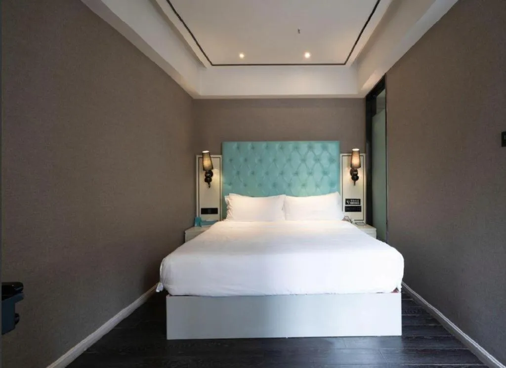 Bed in Xana Hotelle Chongqing Jiefangbei Center Branch