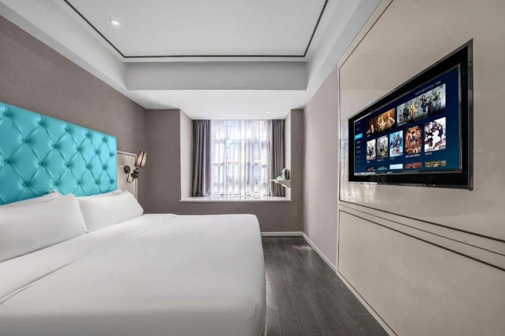 Bed in Xana Hotelle Chongqing Jiefangbei Center Branch