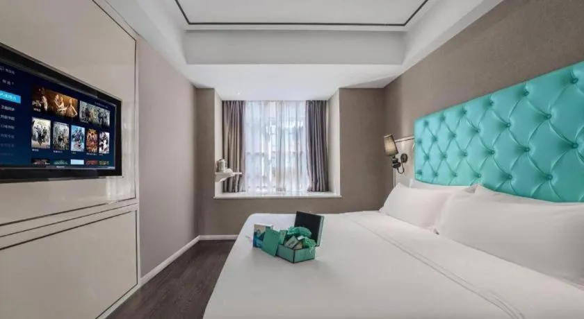 Bed in Xana Hotelle Chongqing Jiefangbei Center Branch