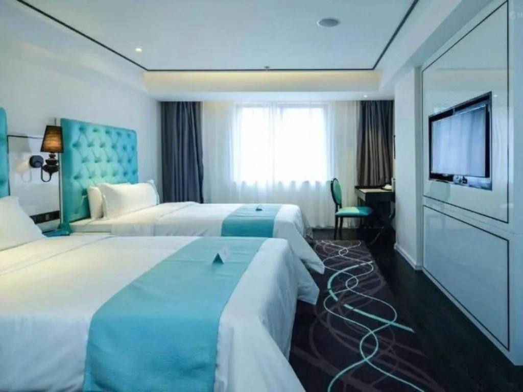 Bed in Xana Hotelle Chongqing Jiefangbei Center Branch