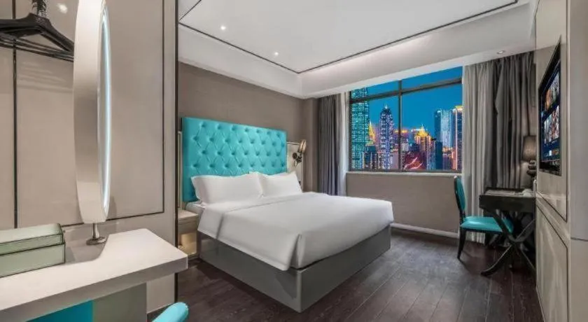 Bed in Xana Hotelle Chongqing Jiefangbei Center Branch