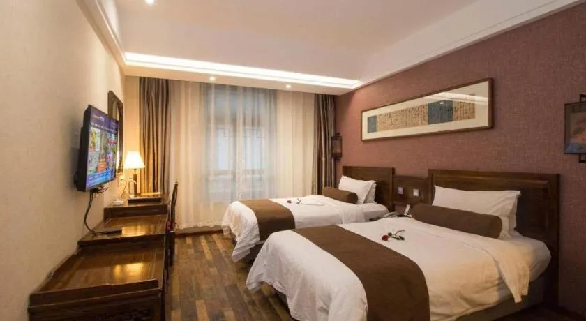 Bed in James Joyce Coffetel Xian Dayanta Metro Station Branch