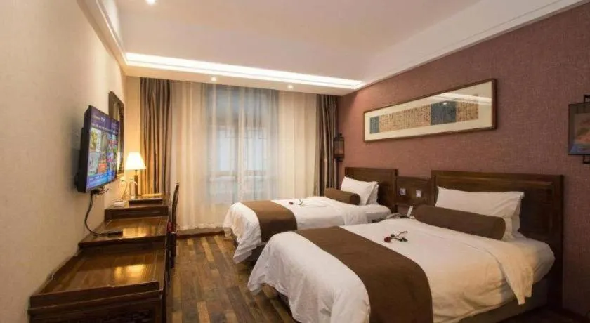 Bed in James Joyce Coffetel Xian Dayanta Metro Station Branch