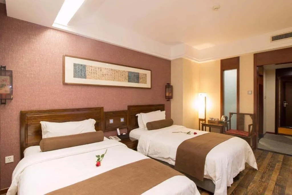 Bed in James Joyce Coffetel Xian Dayanta Metro Station Branch