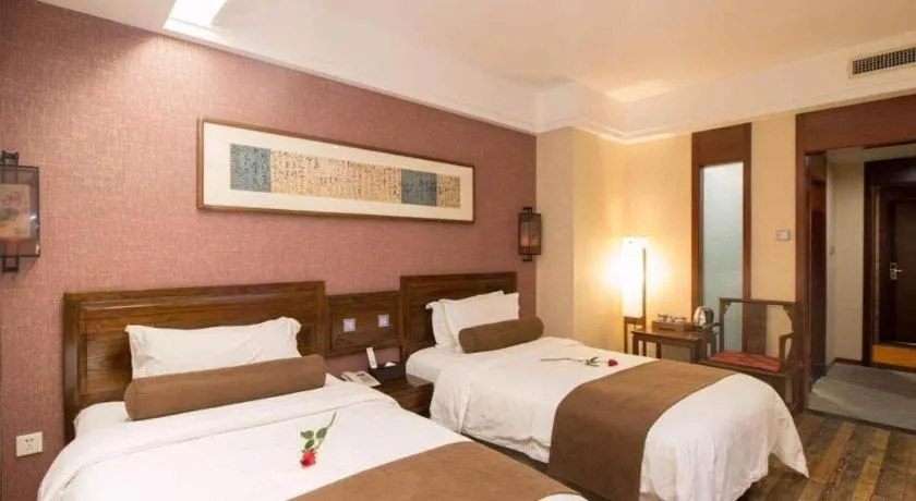 Bed in James Joyce Coffetel Xian Dayanta Metro Station Branch