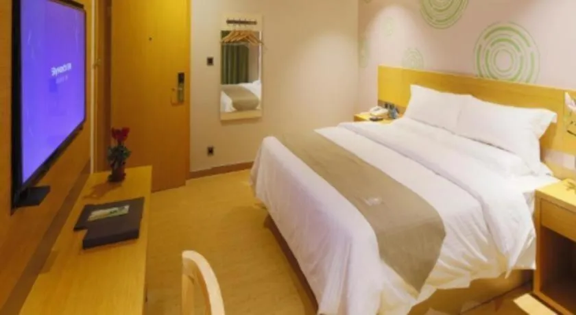 Bed in GreenTree Inn Shandong Heze Caoxian Zhuangzhai Town Oriental Times City Business Hotel