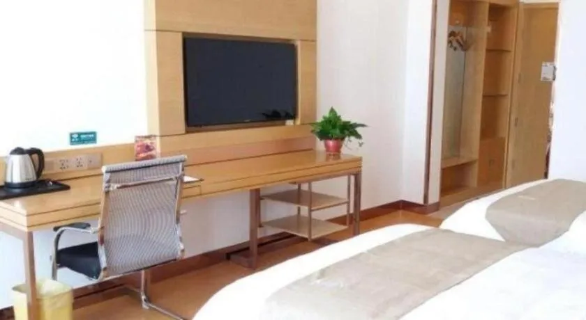 Bed in GreenTree Inn Shandong Heze Caoxian Zhuangzhai Town Oriental Times City Business Hotel