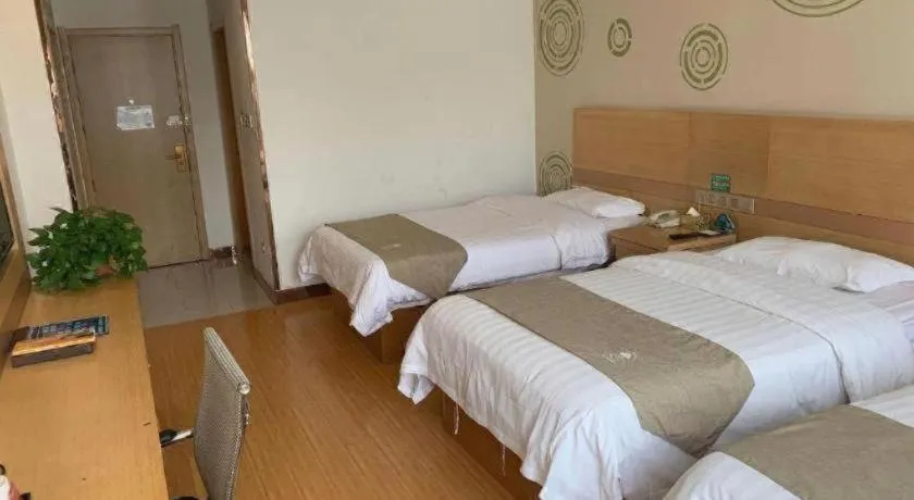 Bed in GreenTree Inn Shandong Heze Caoxian Zhuangzhai Town Oriental Times City Business Hotel